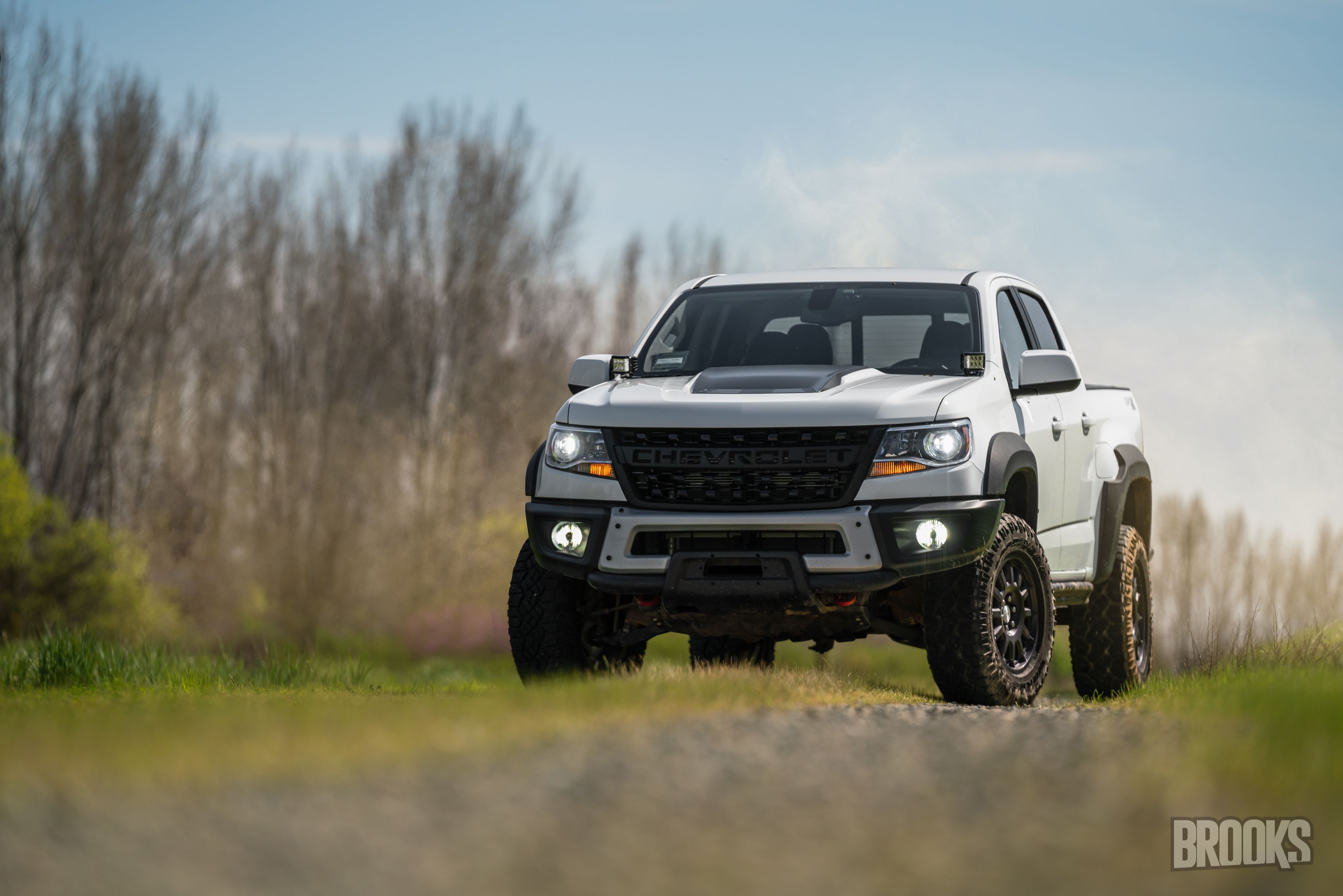 ZR2 on dirt road.jpg